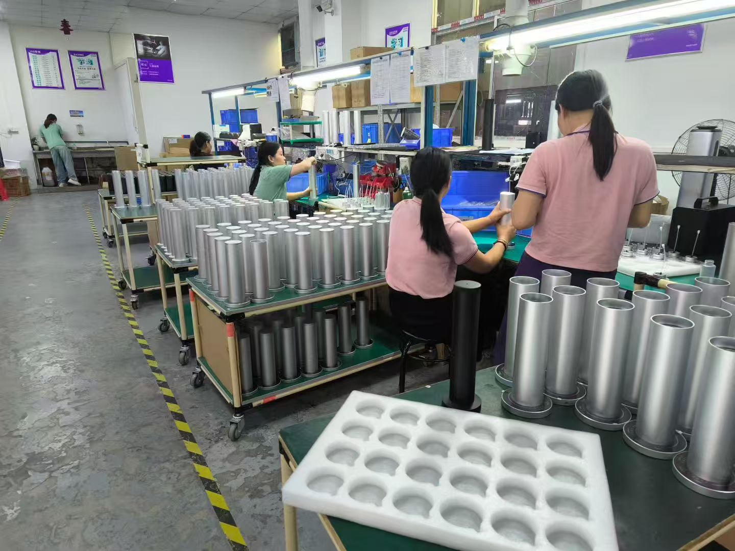 Workers assembling scent diffusers
